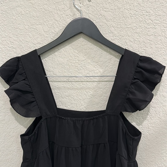 Sleeveless black dress in size M - Picture 9 of 10